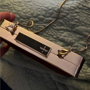 Rebecca minkoff evening clutch with optional strap. Maroon calf hair